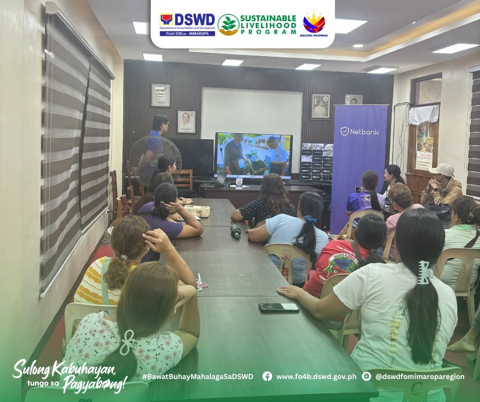 Community livelihood associations attending digital banking orientation